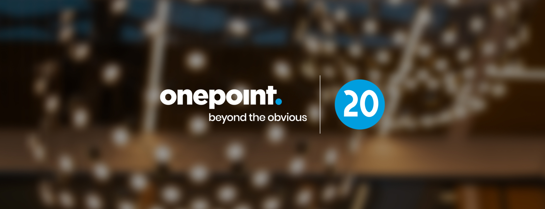 Image représentant le logo onepoint et ses 20 ans dans le cadre de l'inauguration de ses nouveaux espaces à Nantes